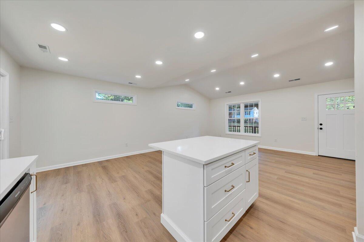 3713 Pinevale Road Roanoke, VA 24018 - Photo 11 of 46 a kitchen with a wooden floor and window