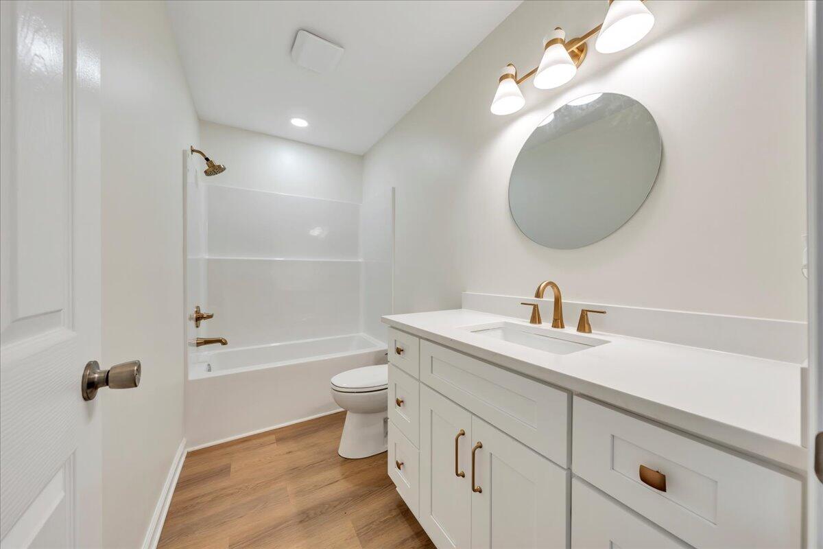 3713 Pinevale Road Roanoke, VA 24018 - Photo 20 of 46 a bathroom with a sink a toilet and a mirror