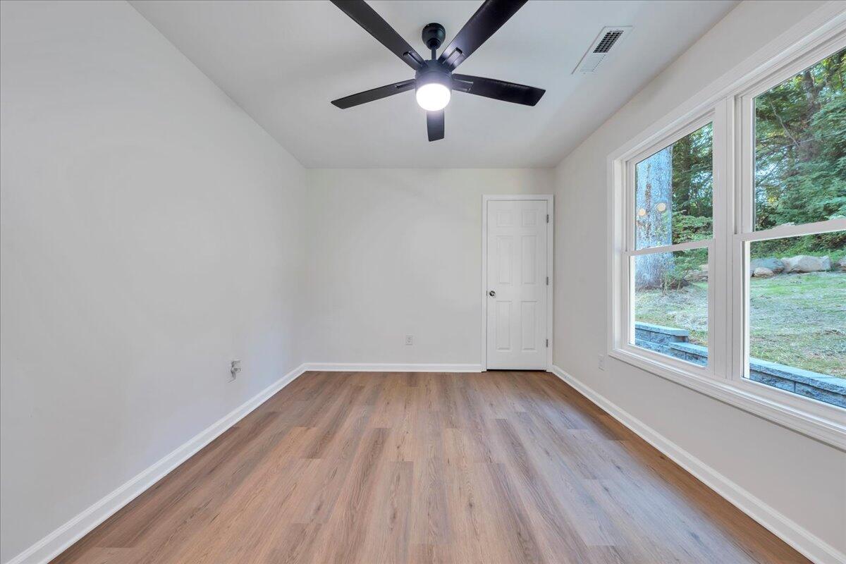 3713 Pinevale Road Roanoke, VA 24018 - Photo 22 of 46 a view of room with window ceiling fan and hardwood floor