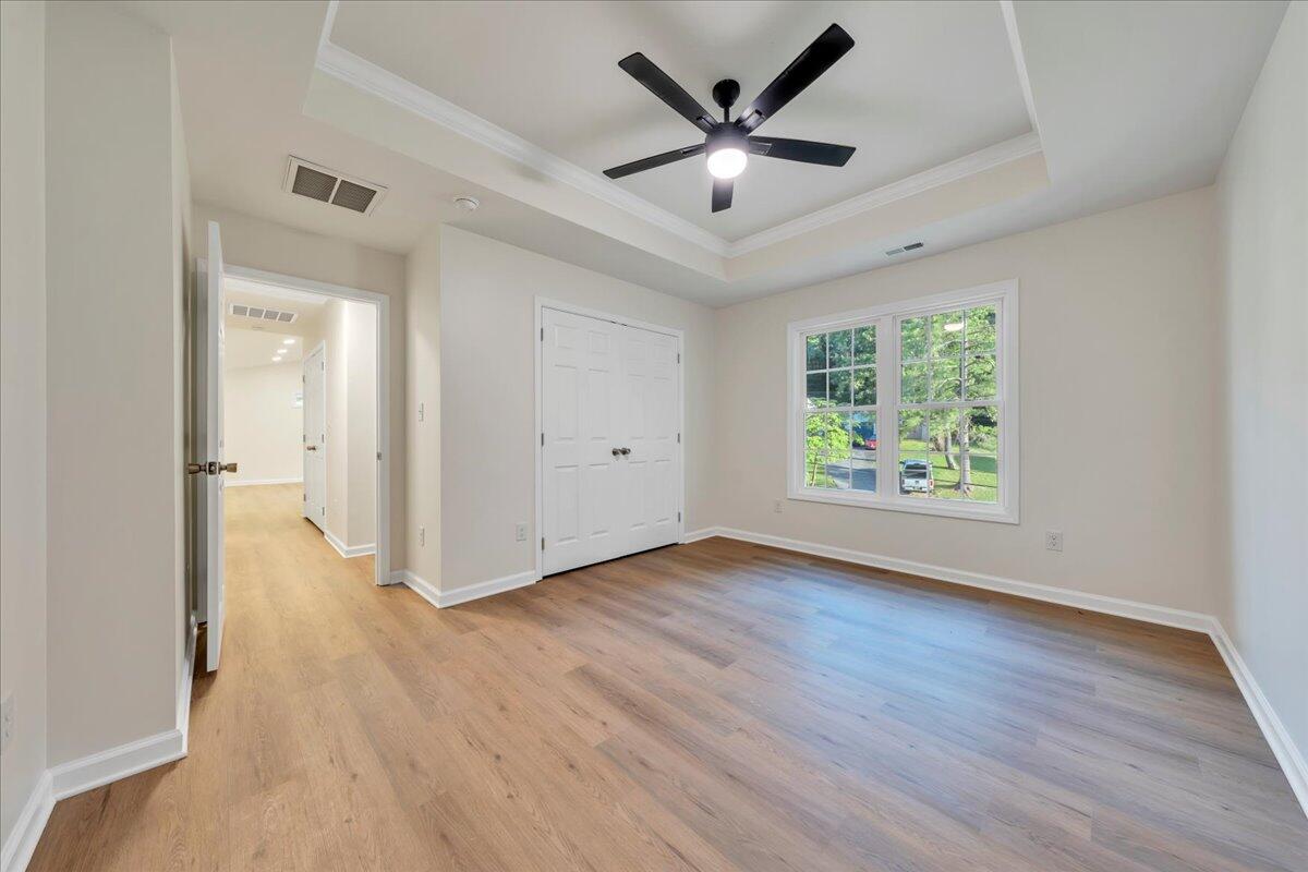 3713 Pinevale Road Roanoke, VA 24018 - Photo 28 of 46 an empty room with wooden floor and windows