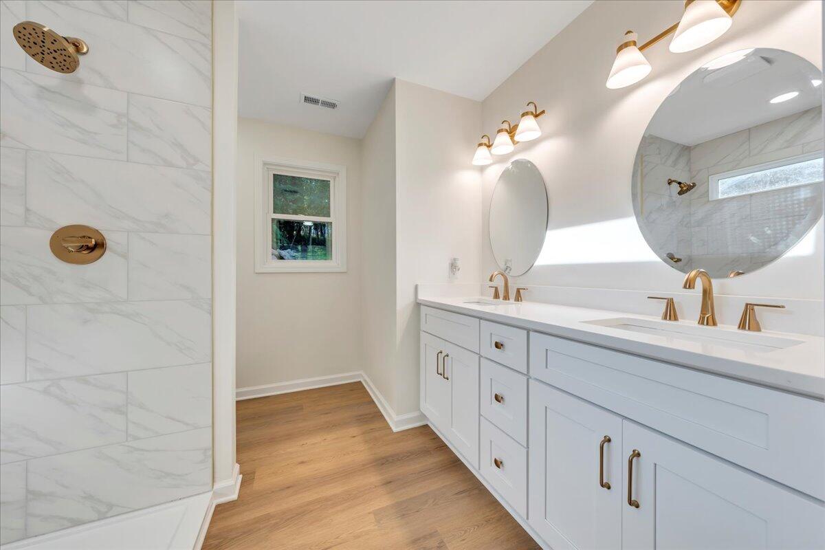 3713 Pinevale Road Roanoke, VA 24018 - Photo 29 of 46 a spacious bathroom with a double vanity sink mirror and