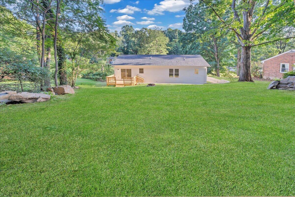 3713 Pinevale Road Roanoke, VA 24018 - Photo 35 of 46 a front view of a house with garden