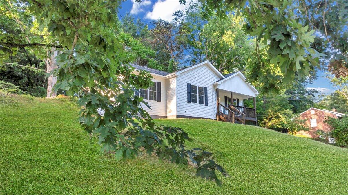 3713 Pinevale Road Roanoke, VA 24018 - Photo 46 of 46 a front view of a house with garden
