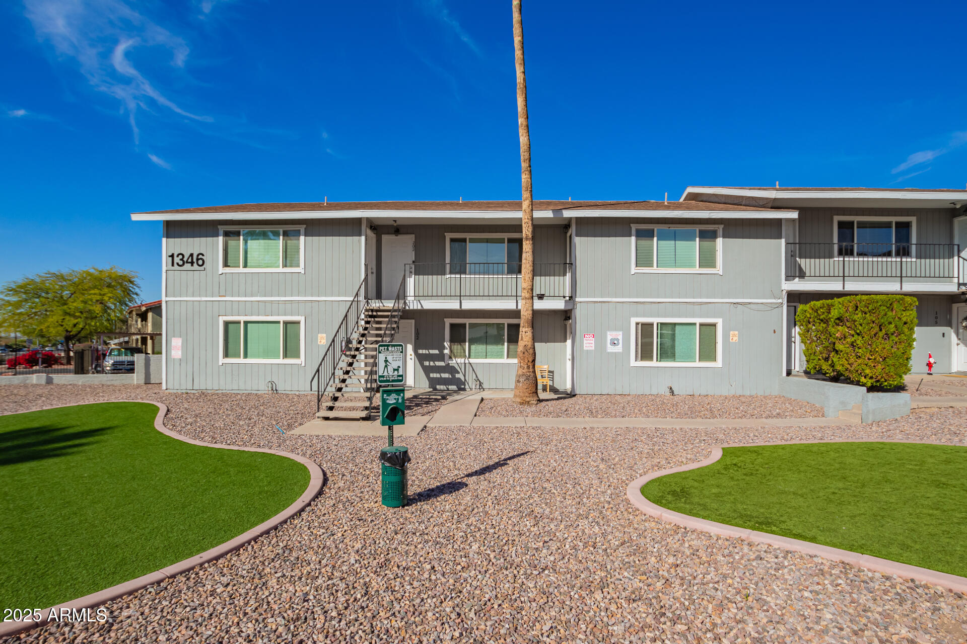 1346 East Mountain View Road, Unit 207 Phoenix, AZ 85020 - Photo 2 of 29 a front view of a house with garden