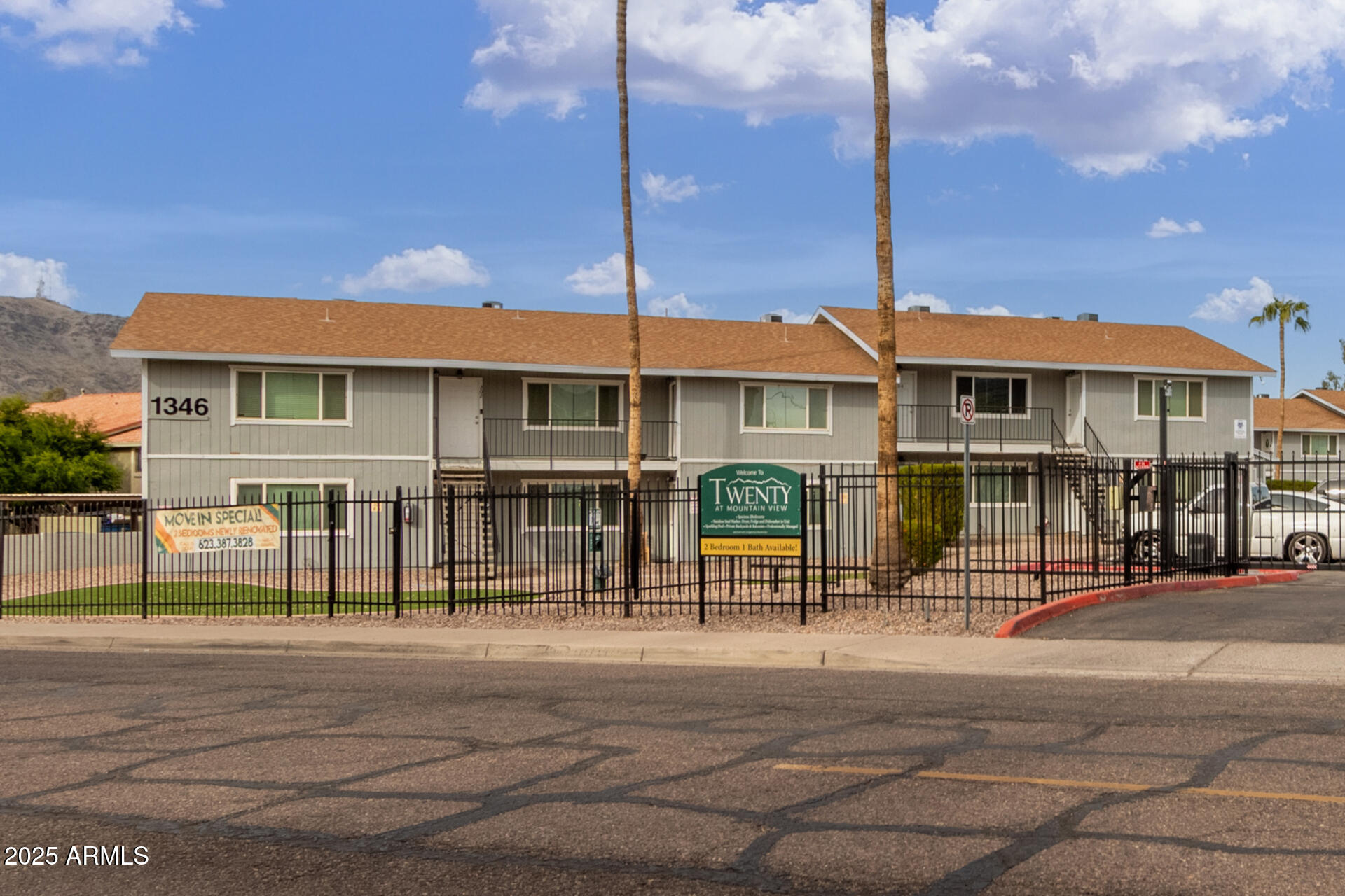 1346 East Mountain View Road, Unit 207 Phoenix, AZ 85020 - Photo 9 of 29 a front view of a house with a garden