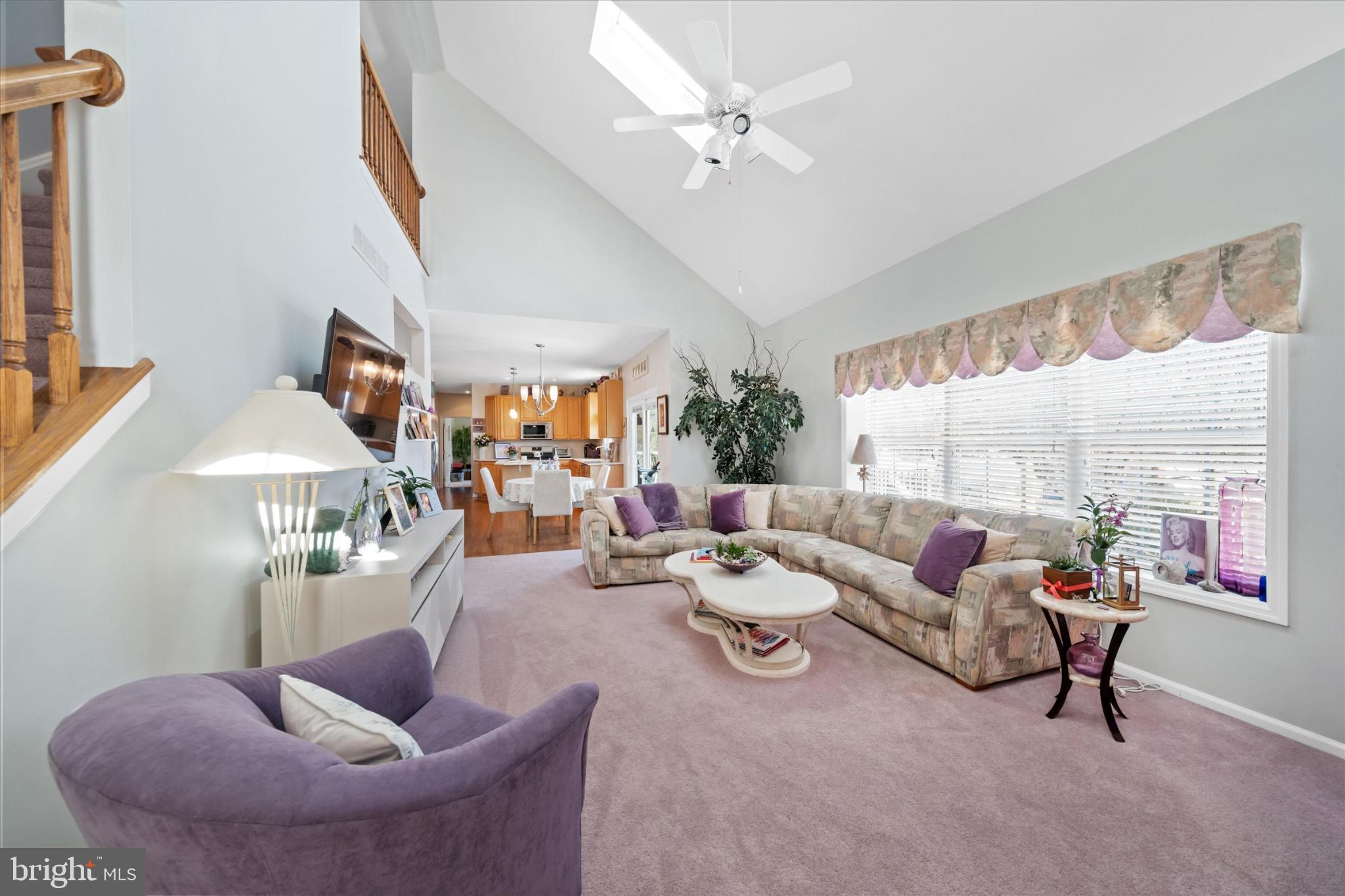 7 Pierson's Ridge Hockessin, DE 19707 - Photo 16 of 52 a living room with furniture and a large window