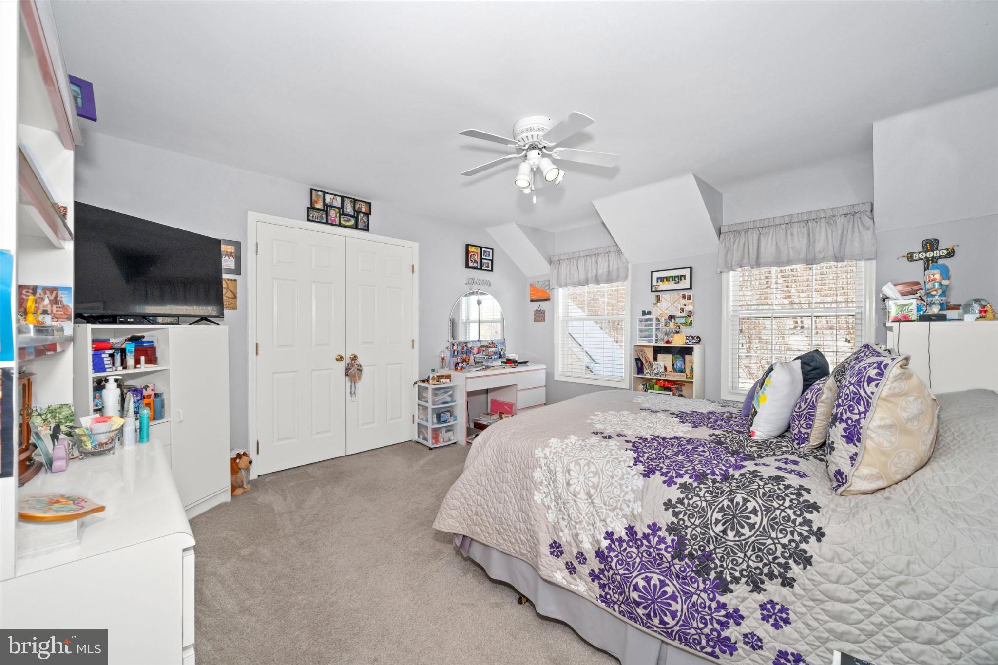 7 Pierson's Ridge Hockessin, DE 19707 - Photo 31 of 52 a bedroom with a bed and a flat screen tv