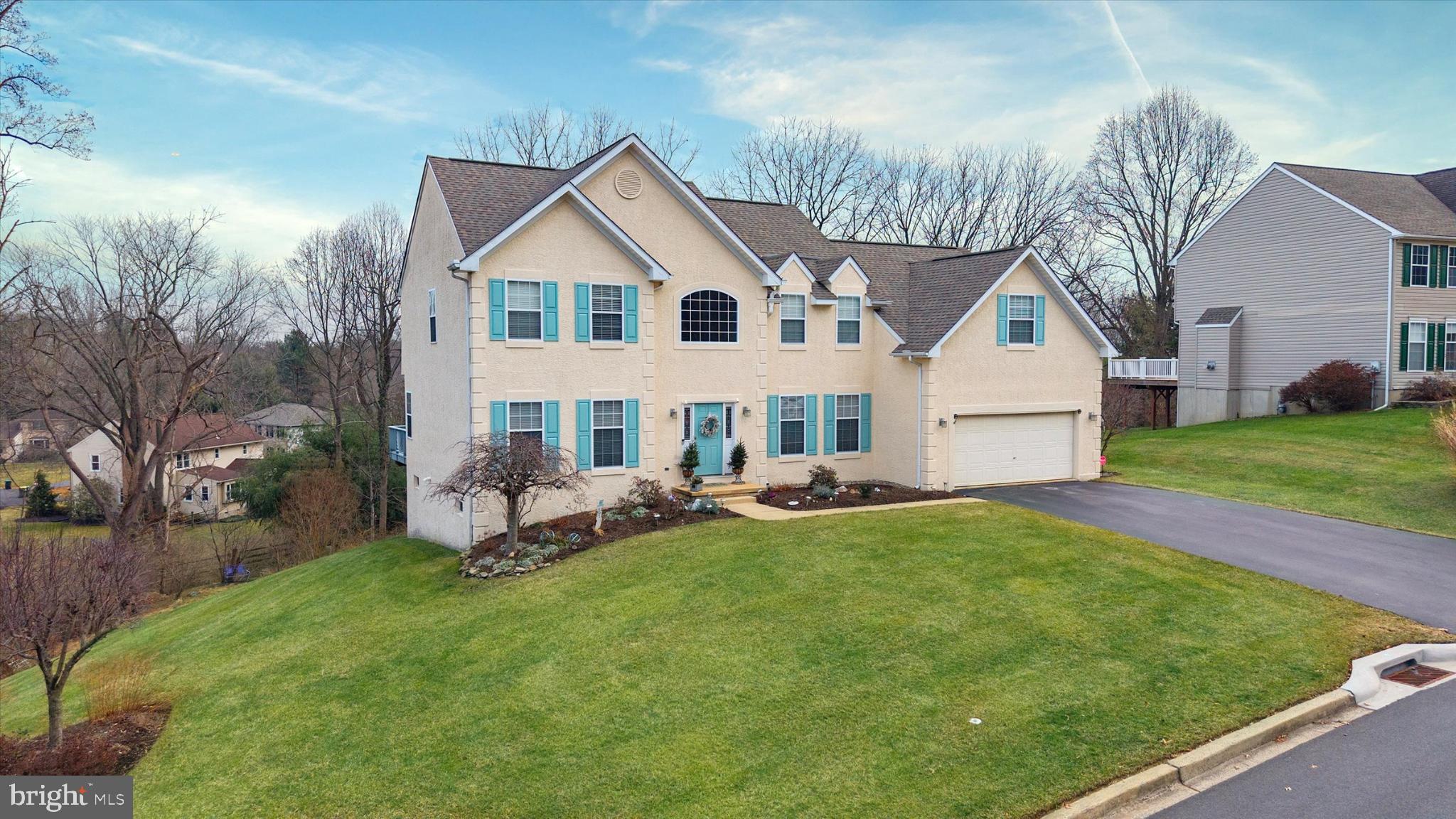 7 Pierson's Ridge Hockessin, DE 19707 - Photo 41 of 52 a view of a house with a yard and sitting area