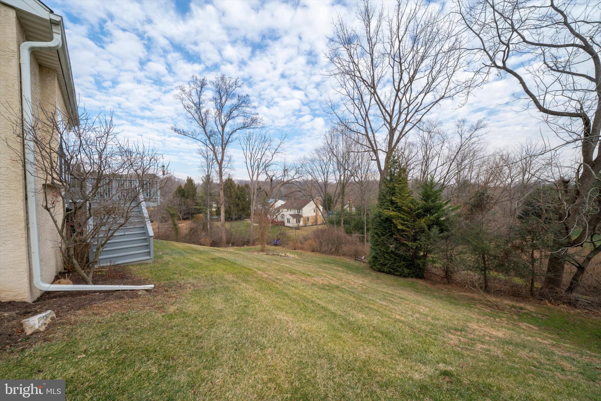 7 Pierson's Ridge Hockessin, DE 19707 - Photo 46 of 52 a view of a yard with a tree