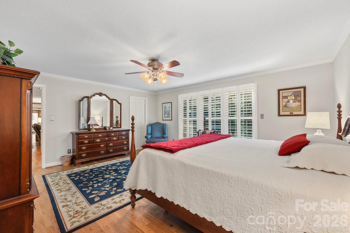 207 Lost Corner Road Morganton, NC 28655 - Photo 32 of 46 a bedroom with bed and wooden floor