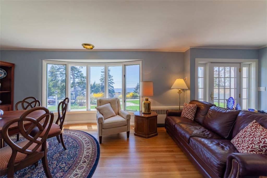 27 Factory Cove Road Boothbay Harbor, ME 04538 - Photo 3 of 32 The great room with dining area,...