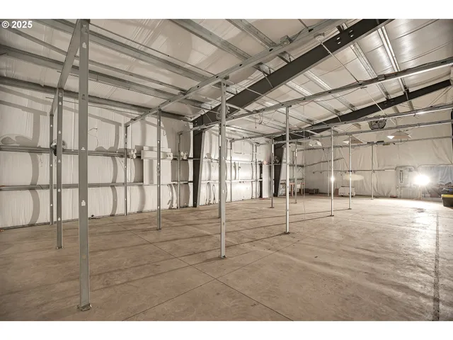 a view of a room with wooden walls