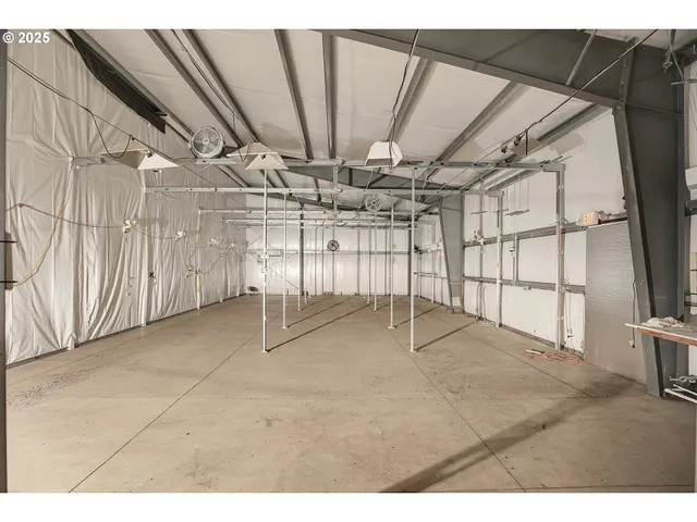 a view of an empty room with stairs