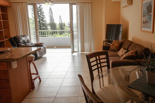 a bedroom with bed and a window