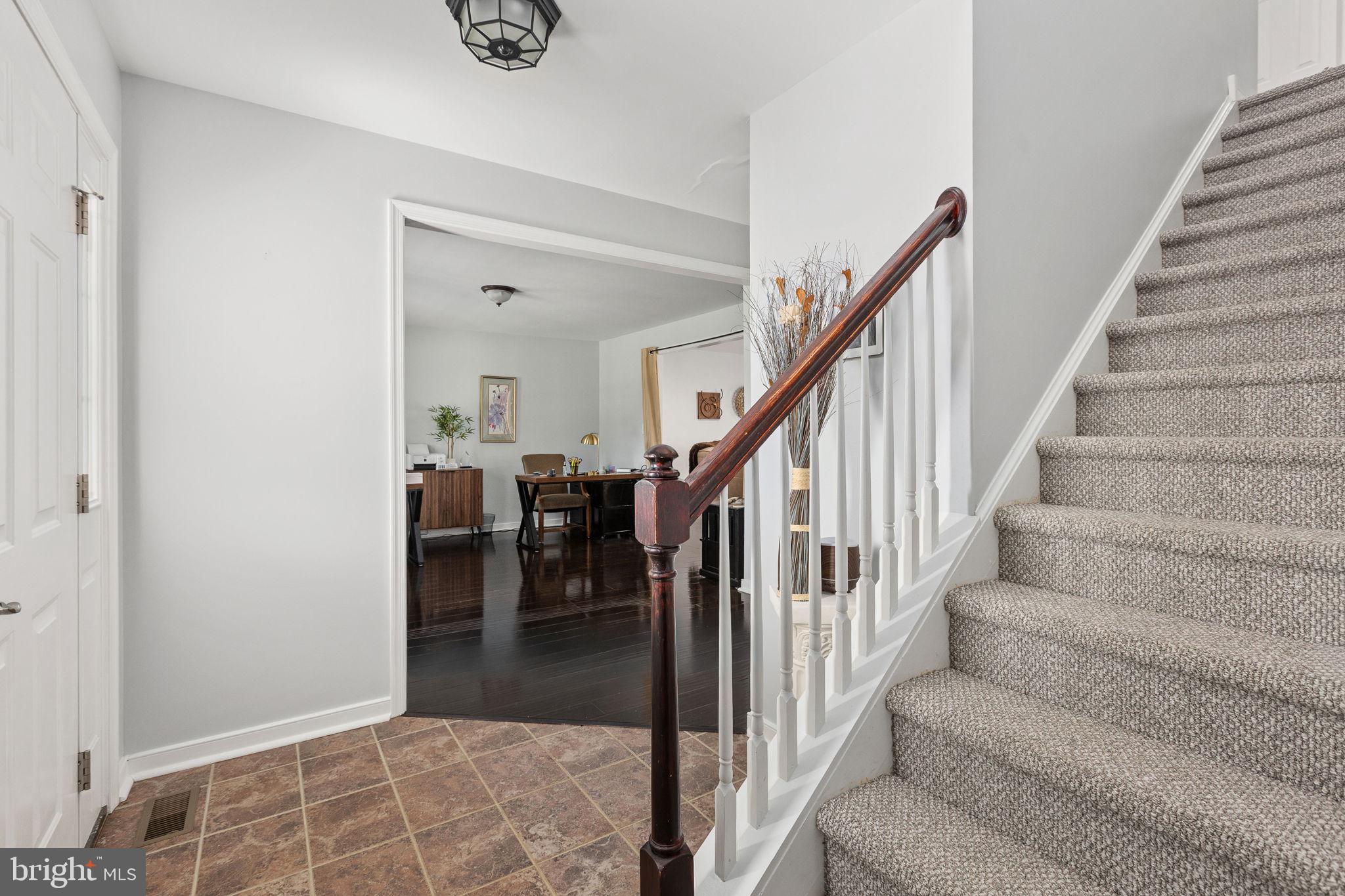 22088 Landora Bridge Road Ruther Glen, VA 22546 - Photo 24 of 122 Inviting entryway with elegant staircase.