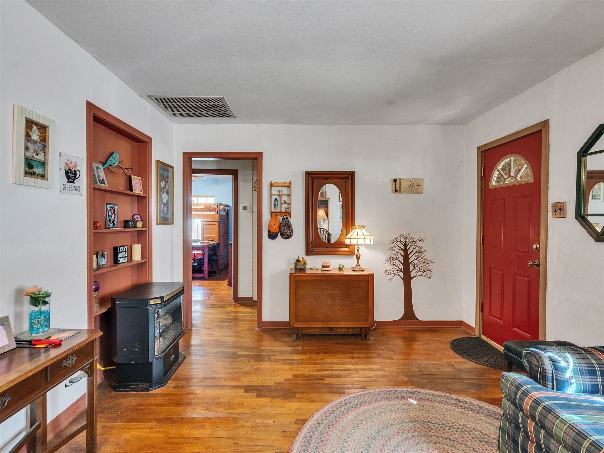 3908 Terry Street Santa Fe, TX 77517 - Photo 11 of 28 a living room with fireplace furniture and a flat screen tv