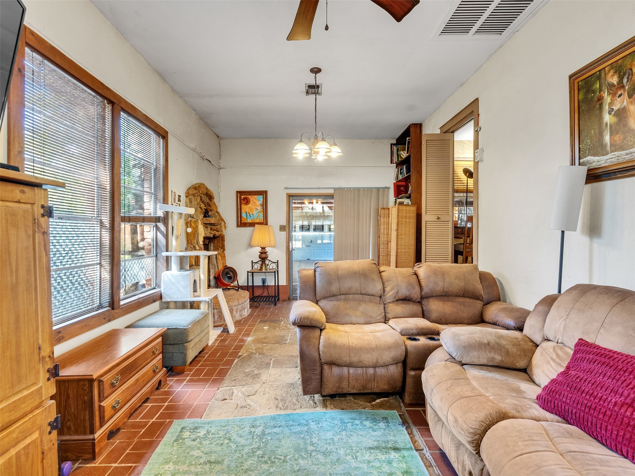 3908 Terry Street Santa Fe, TX 77517 - Photo 22 of 28 a living room with furniture and a chandelier