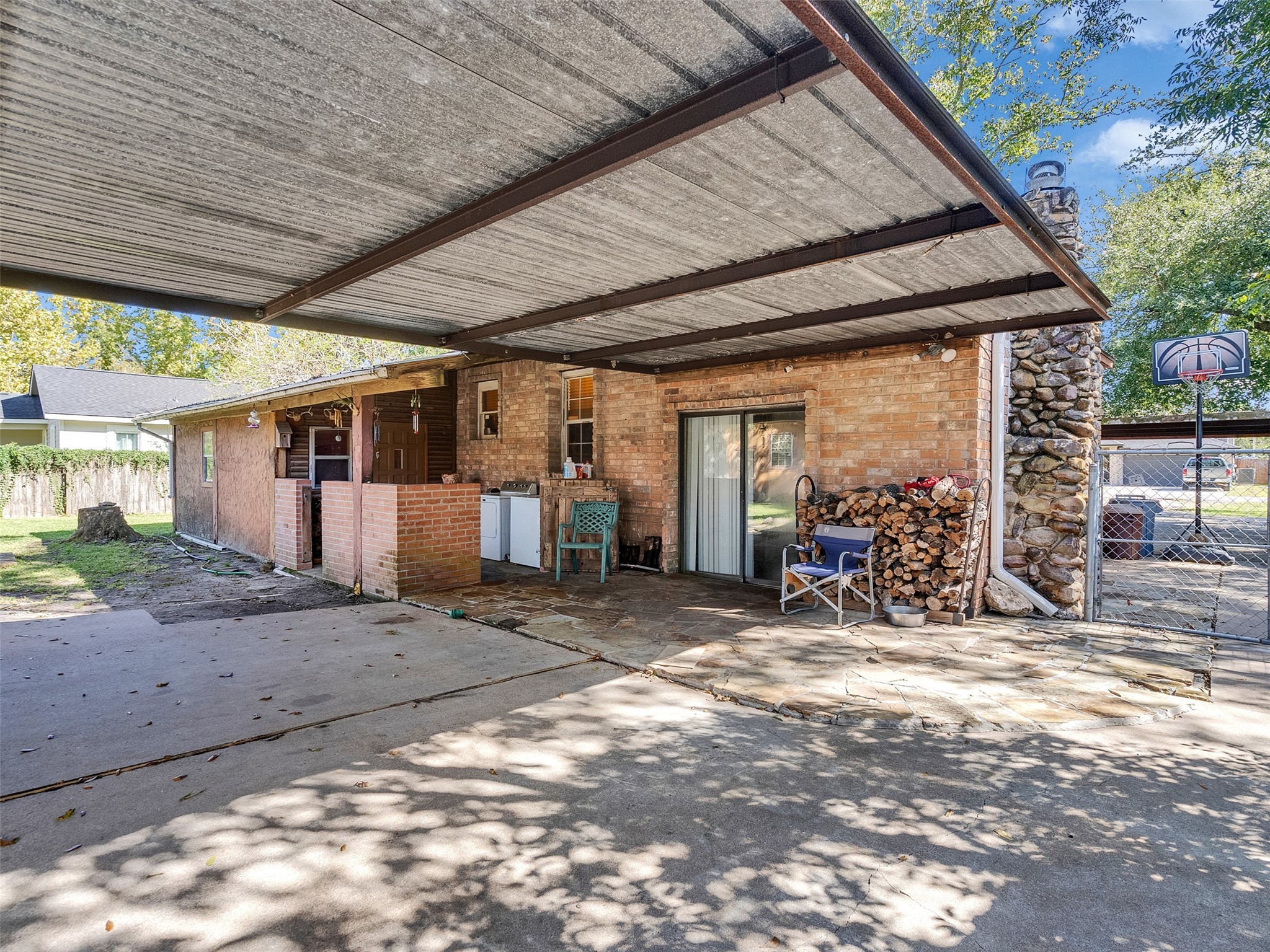 3908 Terry Street Santa Fe, TX 77517 - Photo 25 of 28 a view of a garage with chairs