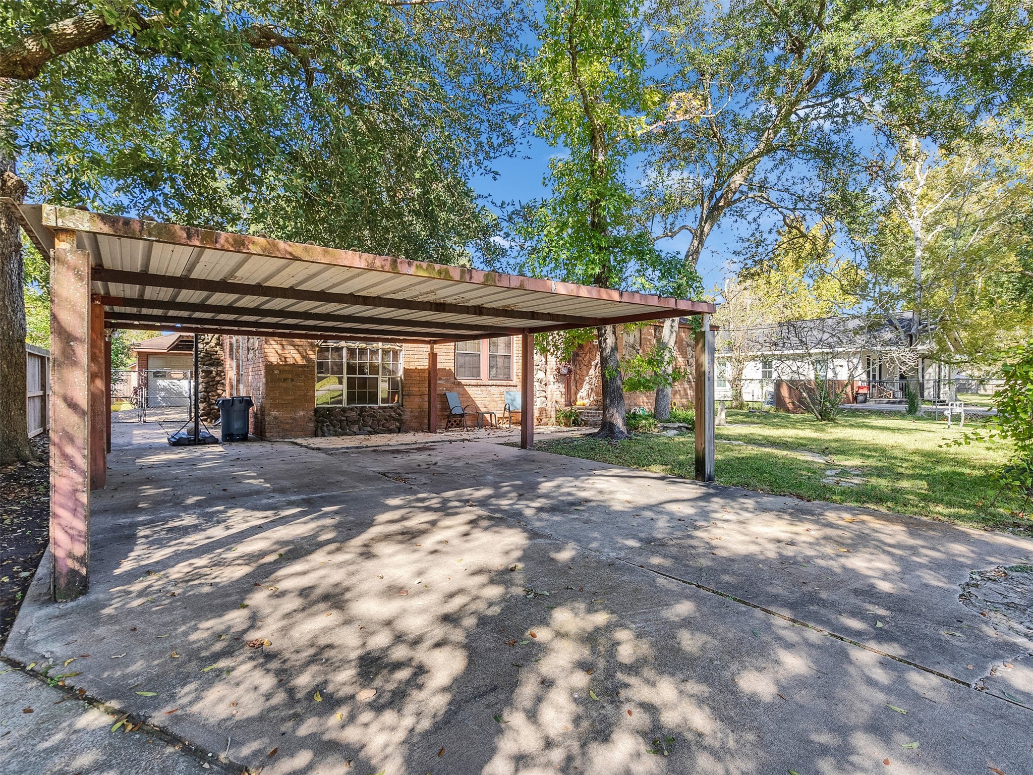 3908 Terry Street Santa Fe, TX 77517 - Photo 4 of 28 a view of a house with backyard and a tree