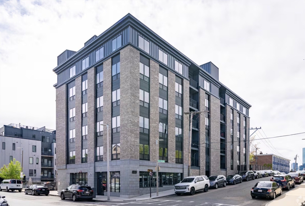 a car parked in front of a building