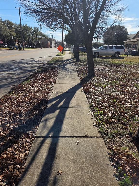 307 North Dallas Avenue Lancaster, TX 75146 - Photo 3 of 8 a view of road with trees