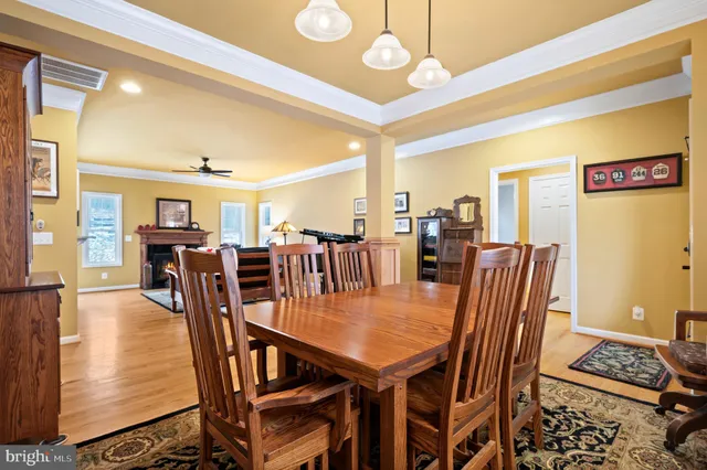 a kitchen with stainless steel appliances granite countertop a stove a sink dishwasher a refrigerator and a microwave