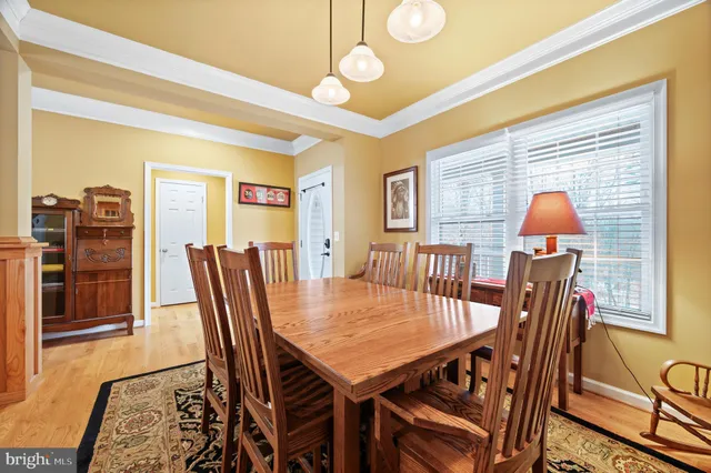 a view of living room with furniture and flat screen tv