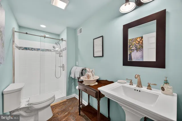 a view of a backyard with sitting area