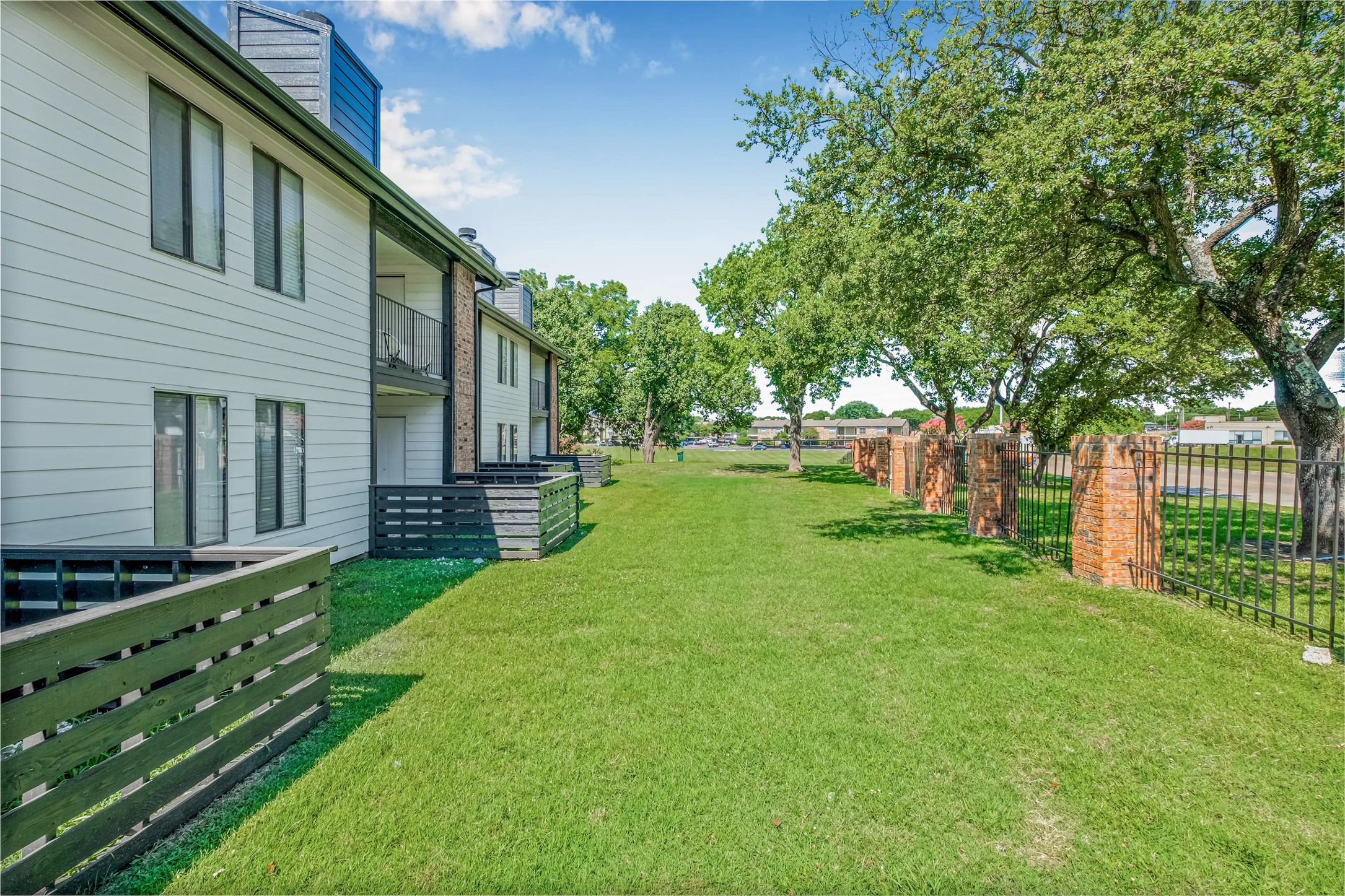 4600 West Pioneer Drive, Unit 302 Irving, TX 75061 - Photo 25 of 48 a view of a backyard with wooden fence