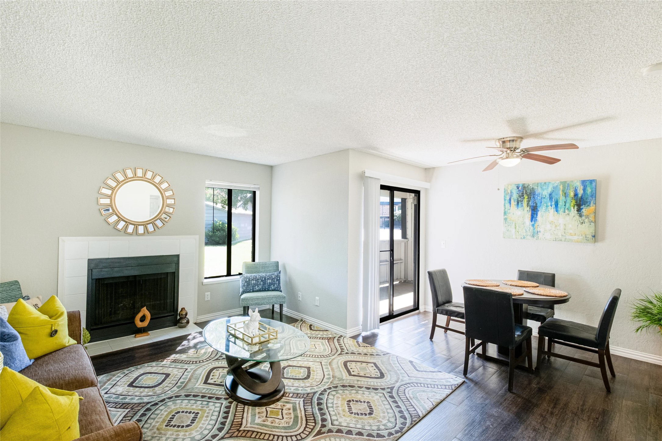 4600 West Pioneer Drive, Unit 302 Irving, TX 75061 - Photo 4 of 48 a living room with furniture a fireplace and a table