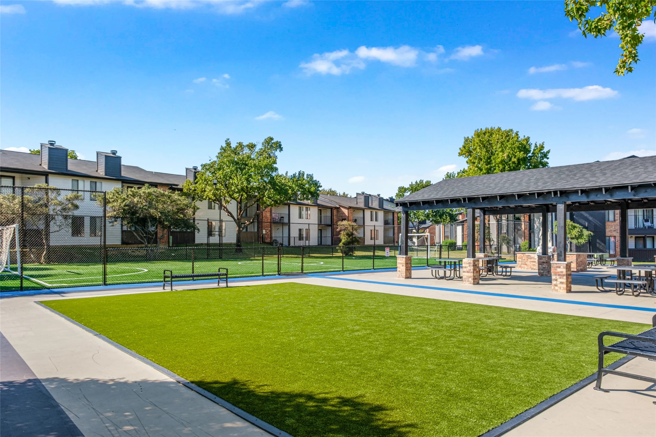 4600 West Pioneer Drive, Unit 302 Irving, TX 75061 - Photo 45 of 48 a view of a swimming pool and a yard
