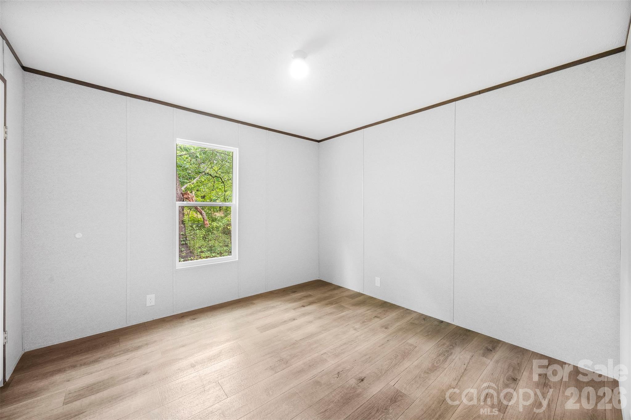 321 Bell Road Kings Mountain, NC 28086 - Photo 21 of 32 an empty room with a window