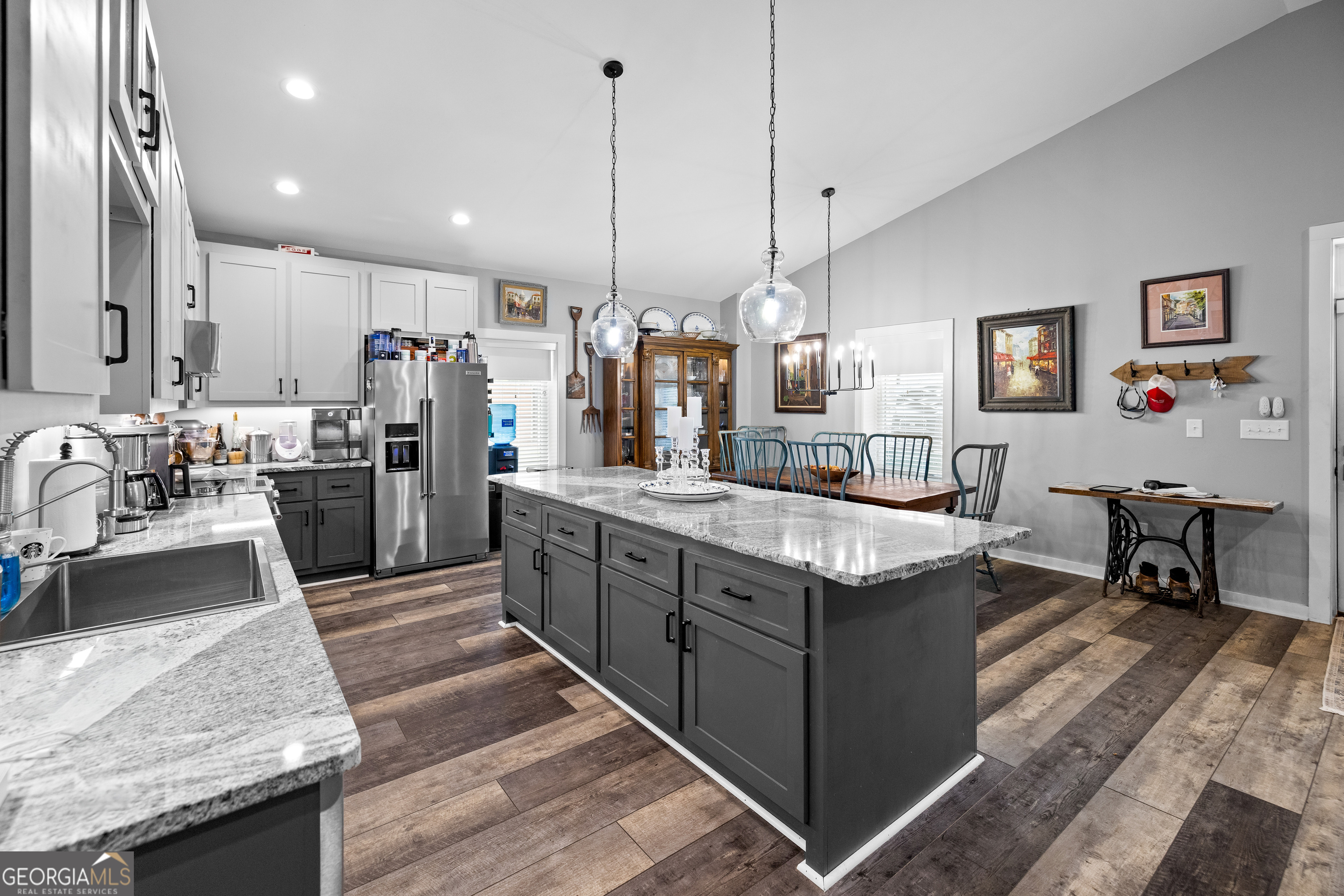 2109 Brewers Mill Road Elberton, GA 30635 - Photo 11 of 51 a kitchen with stainless steel appliances granite countertop sink stove top oven and refrigerator