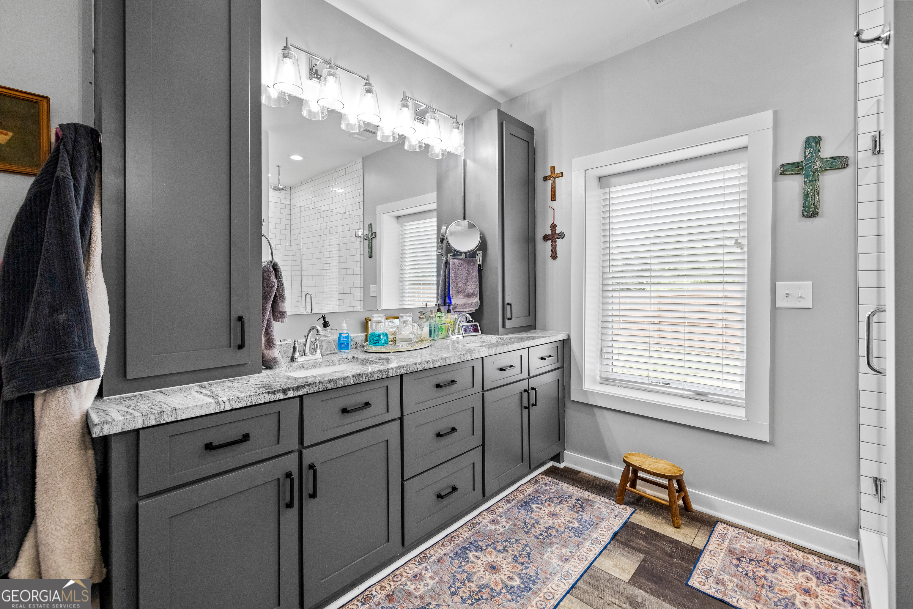 2109 Brewers Mill Road Elberton, GA 30635 - Photo 14 of 51 a bathroom with a double vanity sink and a mirror