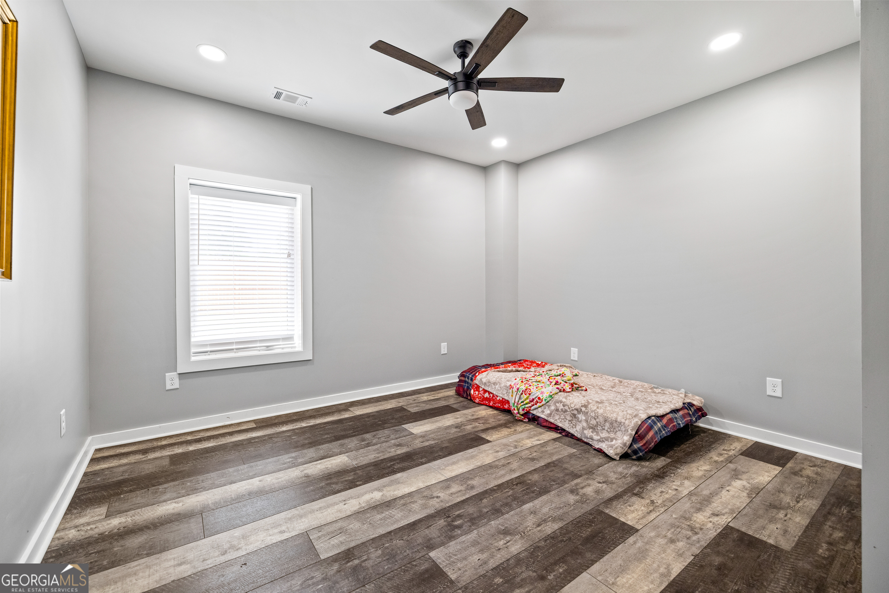 2109 Brewers Mill Road Elberton, GA 30635 - Photo 20 of 51 a bedroom with a bed and a window