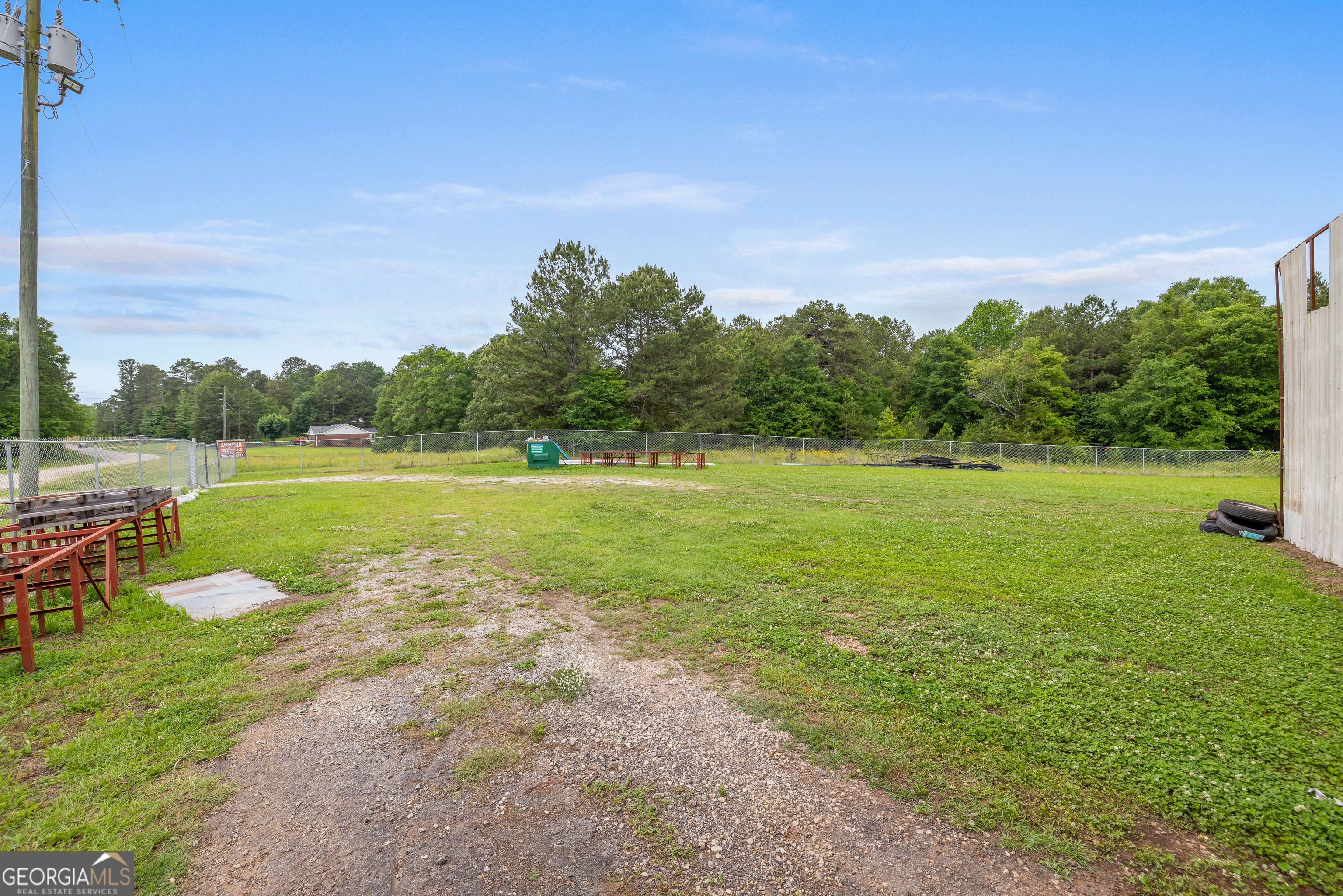 2109 Brewers Mill Road Elberton, GA 30635 - Photo 31 of 51 a view of a lake with houses in the background