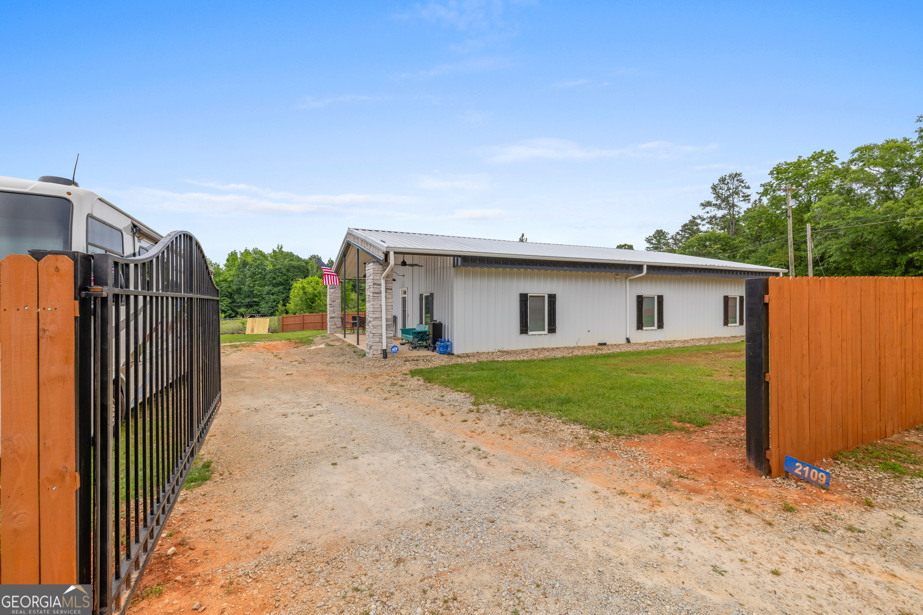 2109 Brewers Mill Road Elberton, GA 30635 - Photo 34 of 51 a view of a house with backyard and trees