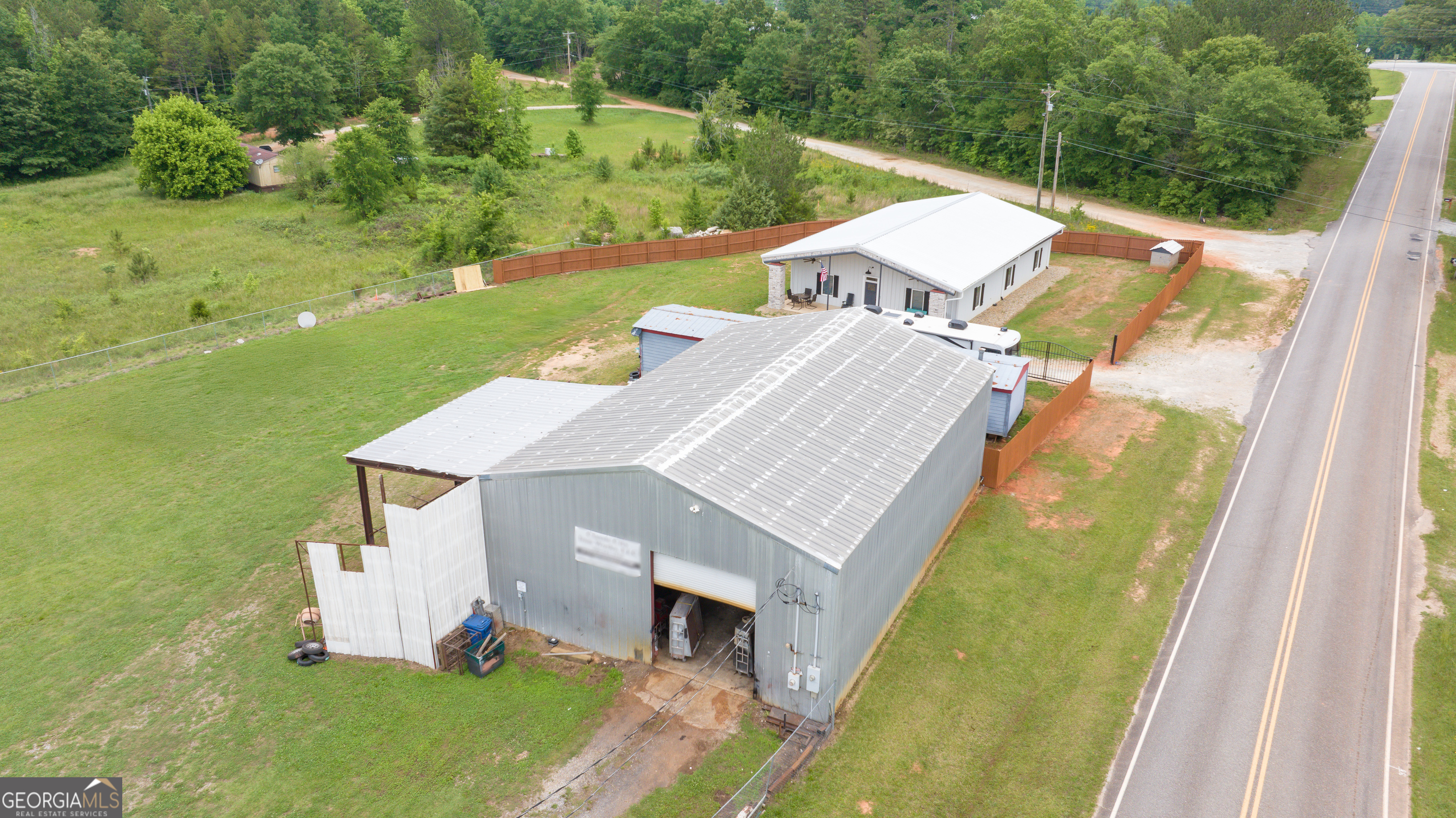 2109 Brewers Mill Road Elberton, GA 30635 - Photo 37 of 51 an aerial view of a house with swimming pool garden and mountain view