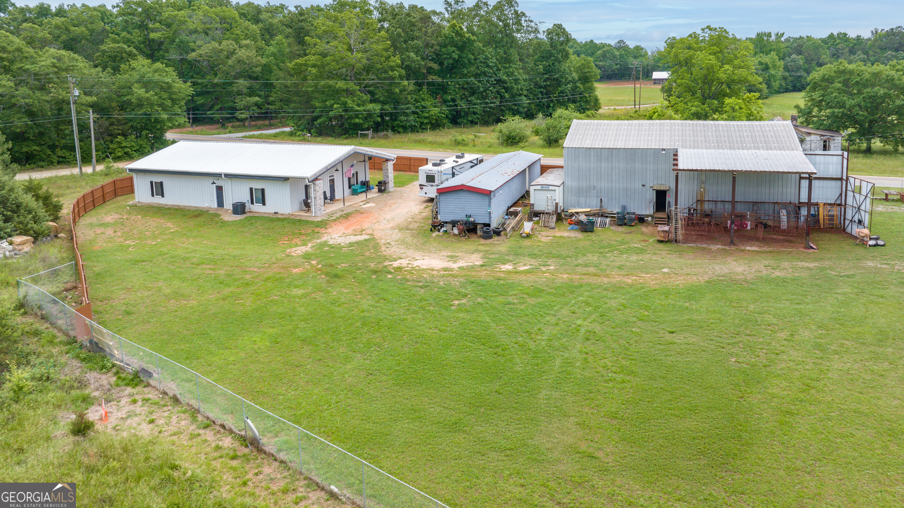 2109 Brewers Mill Road Elberton, GA 30635 - Photo 38 of 51 a aerial view of a house with swimming pool and sitting area