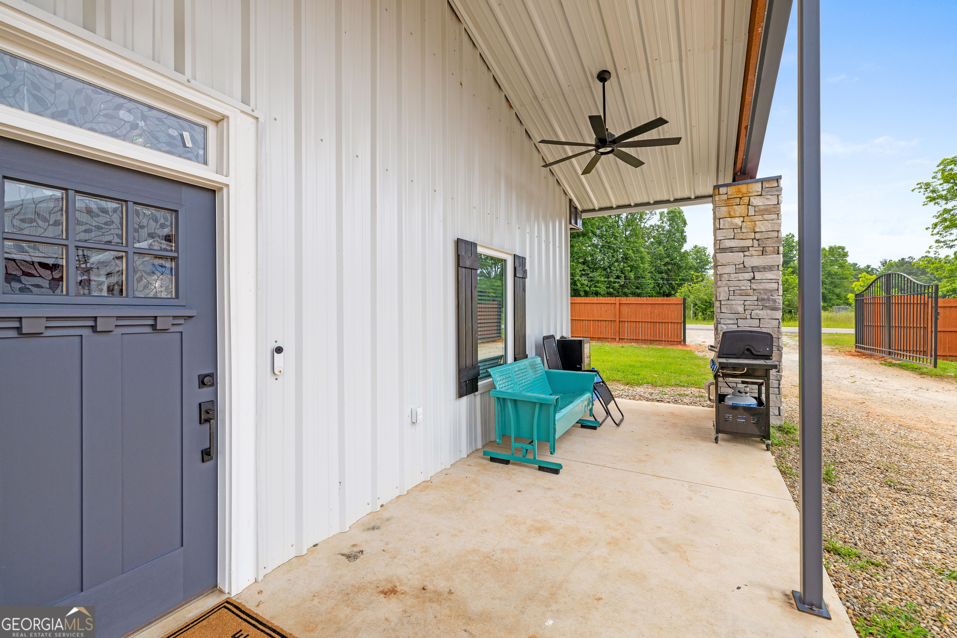 2109 Brewers Mill Road Elberton, GA 30635 - Photo 4 of 51 a view of two chairs in the balcony