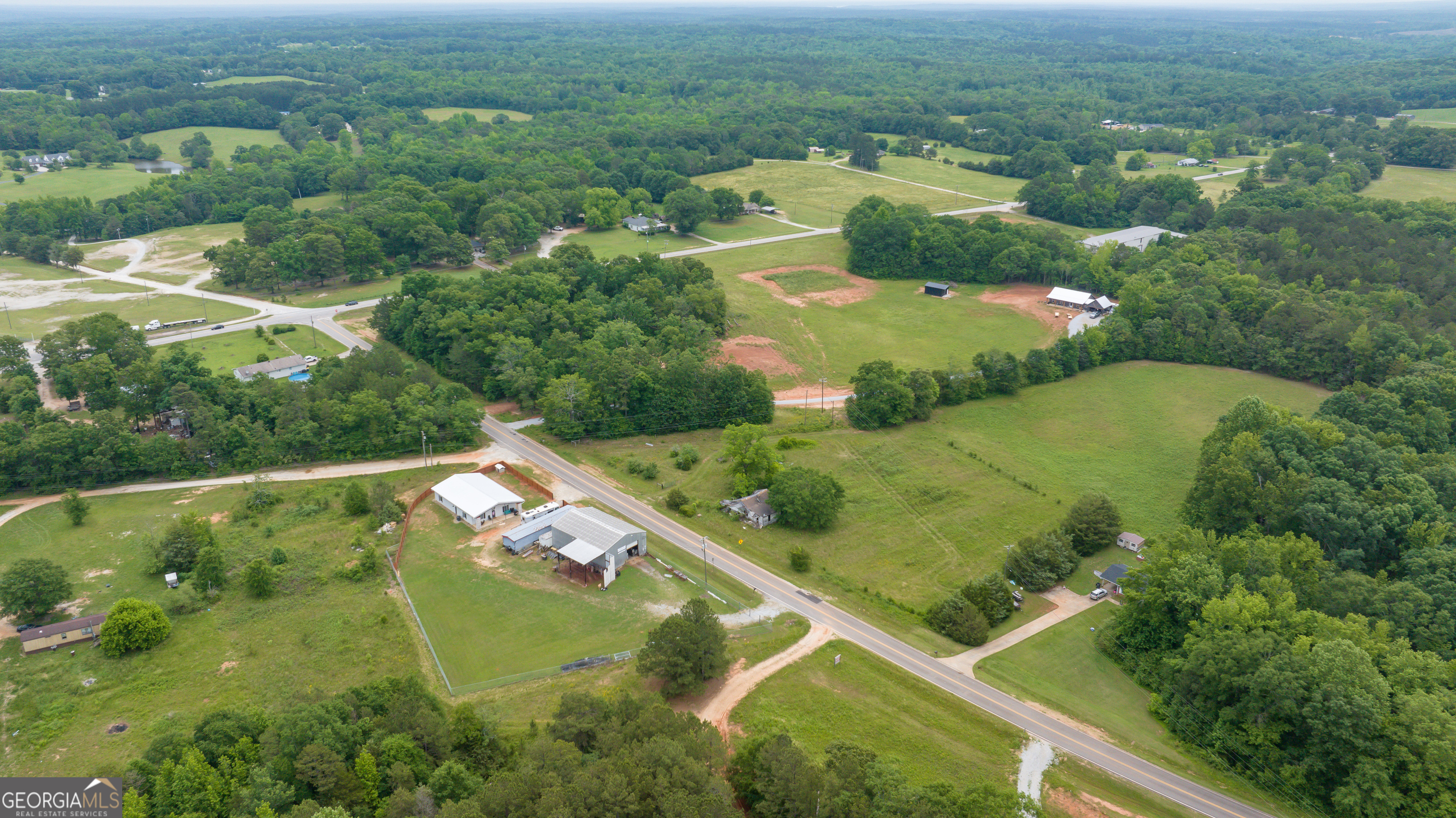2109 Brewers Mill Road Elberton, GA 30635 - Photo 50 of 51 an aerial view of residential houses with outdoor space