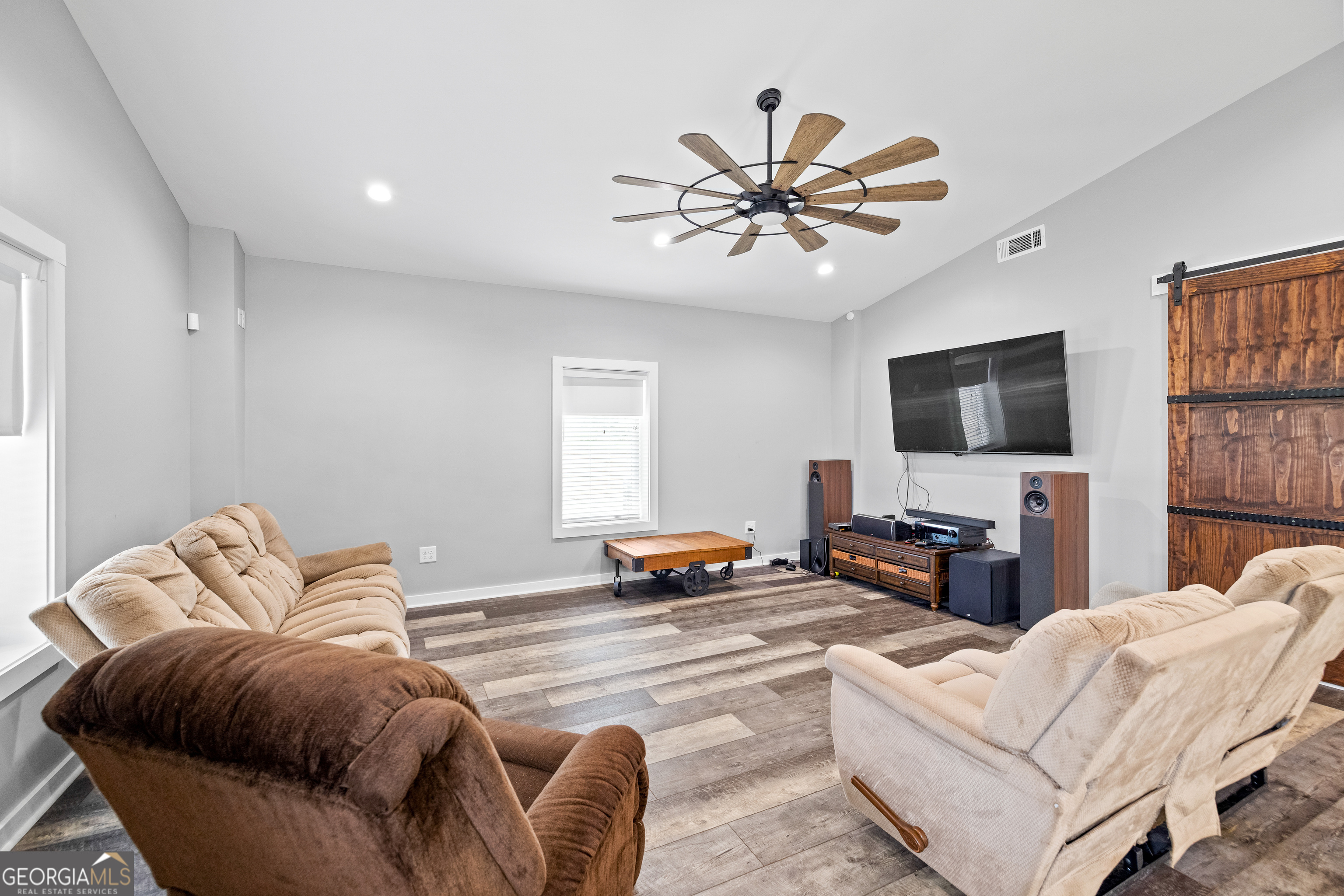 2109 Brewers Mill Road Elberton, GA 30635 - Photo 5 of 51 a living room with furniture and a flat screen tv