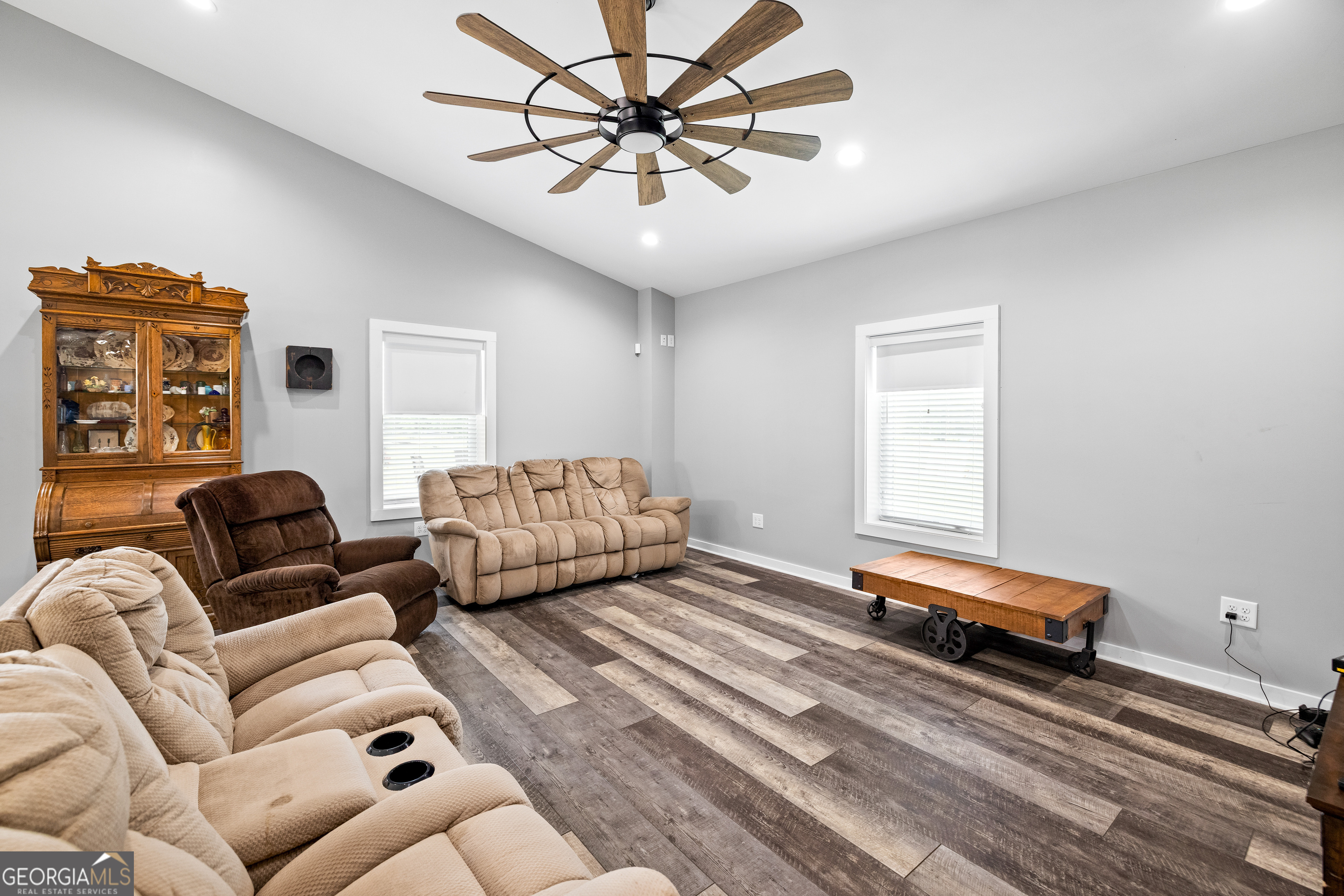 2109 Brewers Mill Road Elberton, GA 30635 - Photo 6 of 51 a living room with furniture and a chandelier