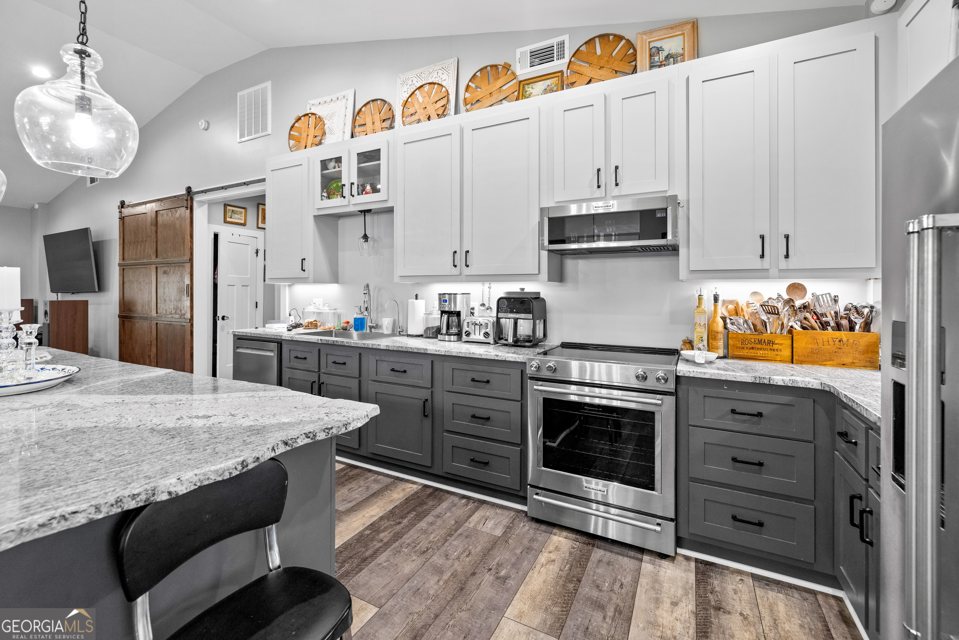 2109 Brewers Mill Road Elberton, GA 30635 - Photo 10 of 51 a kitchen with stainless steel appliances granite countertop a stove and a refrigerator
