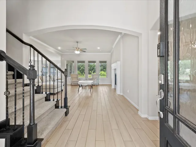 a view of entryway with wooden floor