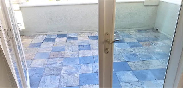 a view of walk in closet with white walls