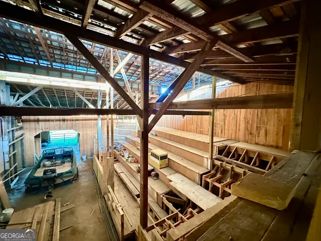 a view of a balcony with chairs