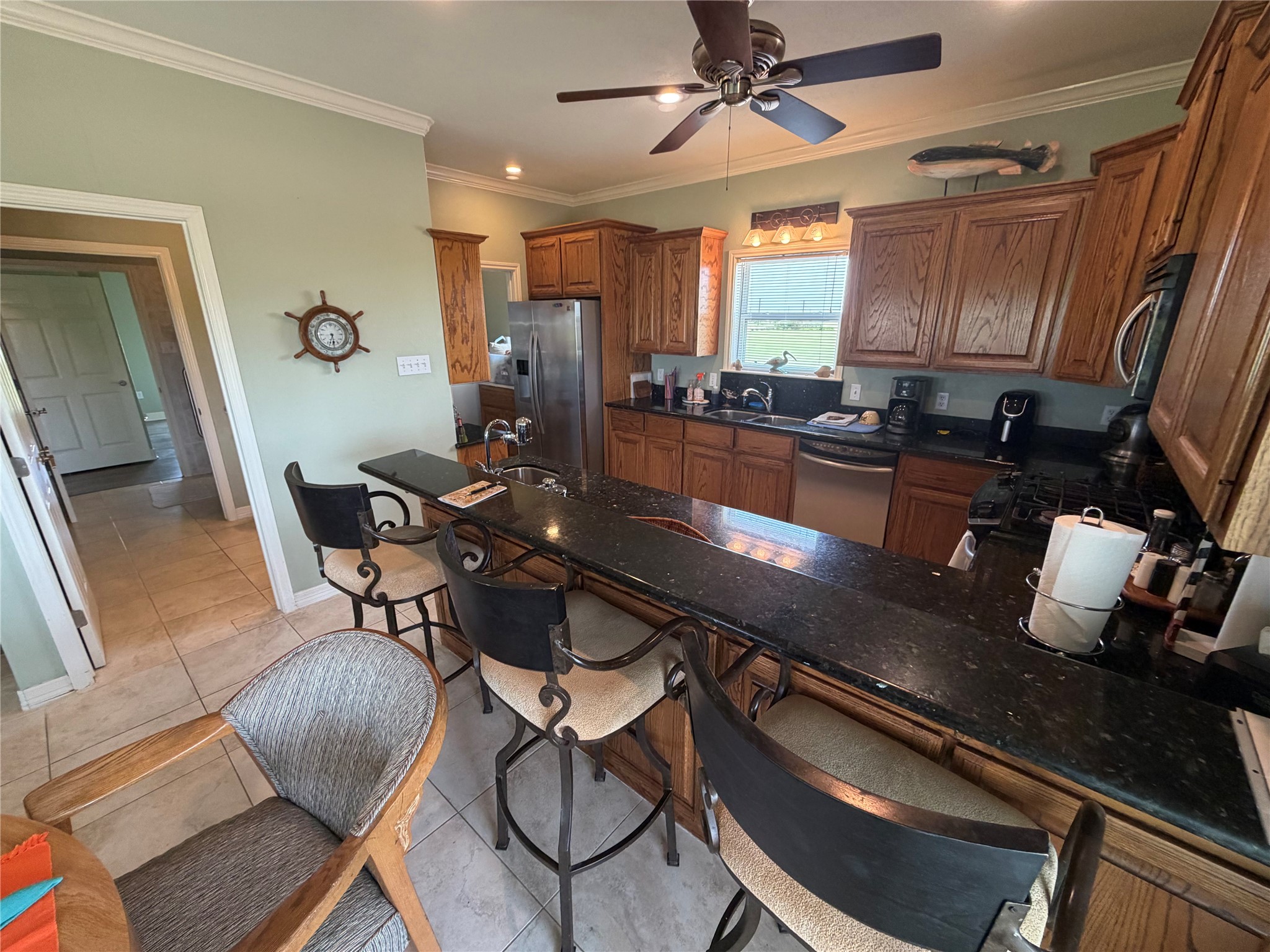 979 Rancho Carribe Drive Crystal Beach, TX 77650 - Photo 26 of 50 View of Bar area into Kitchen