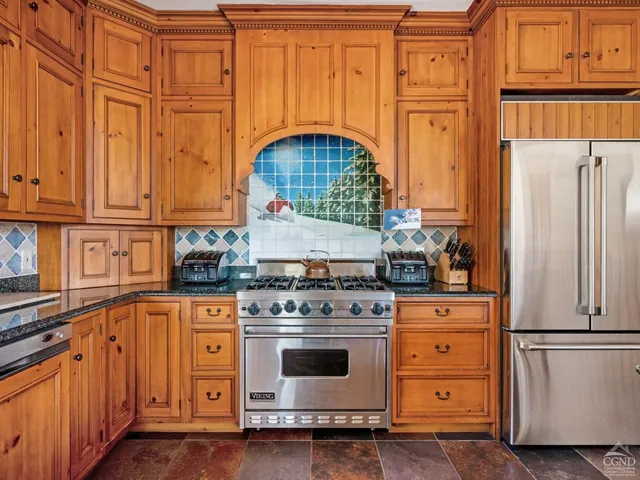 a bathroom with a toilet a sink and bathtub