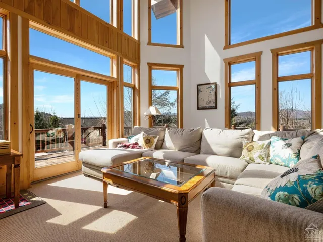 a kitchen with granite countertop wooden cabinets and stainless steel appliances